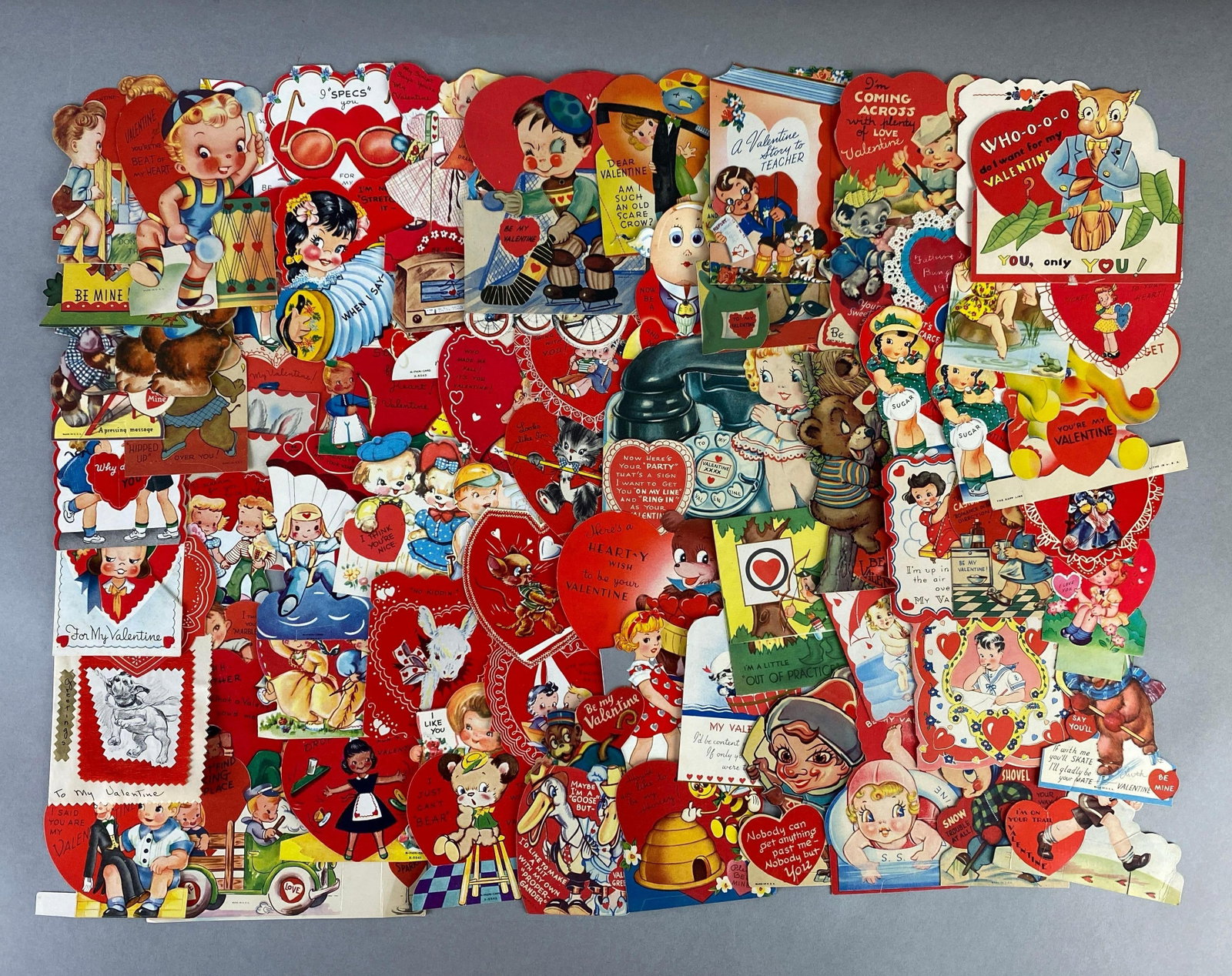 Group of Vintage Valentines: Features animals, children, toys and more, largest measures 7 x 6 inches