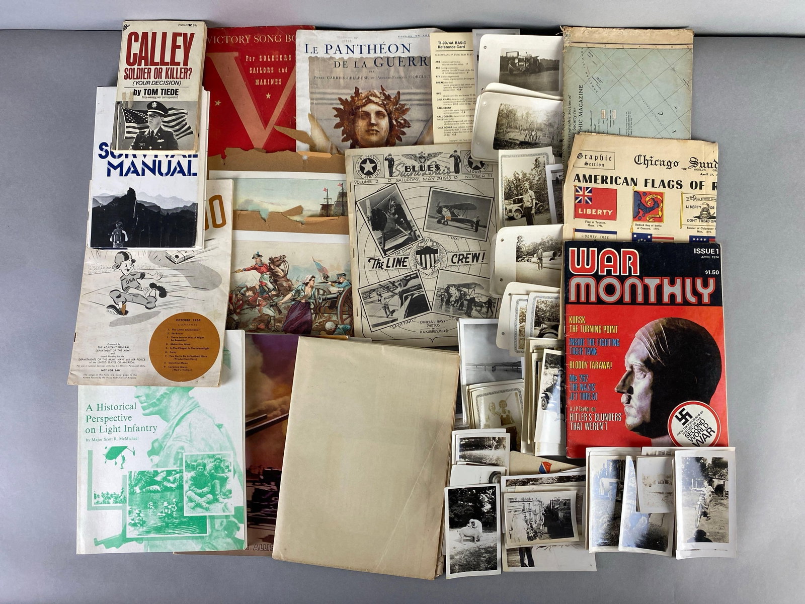 Group of Military Ephemera: Includes books, photographs, magazines and more, mostly US Based, largest measures 13 x 10 inches
