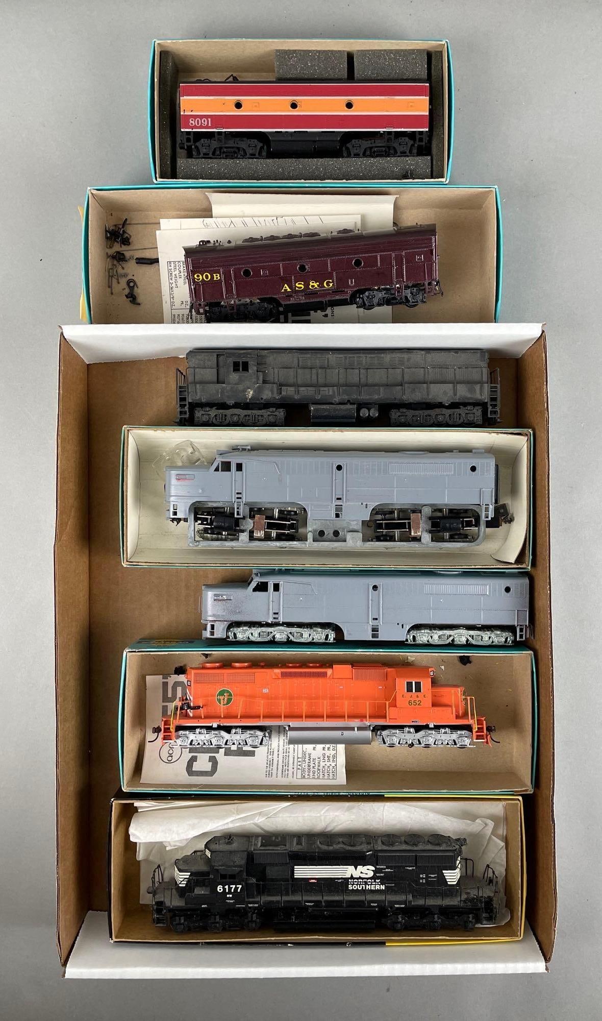 Group of HO Scale Locomotives and Tenders: Includes Norfolk Southern, painted diesel locomotives, EJ and E