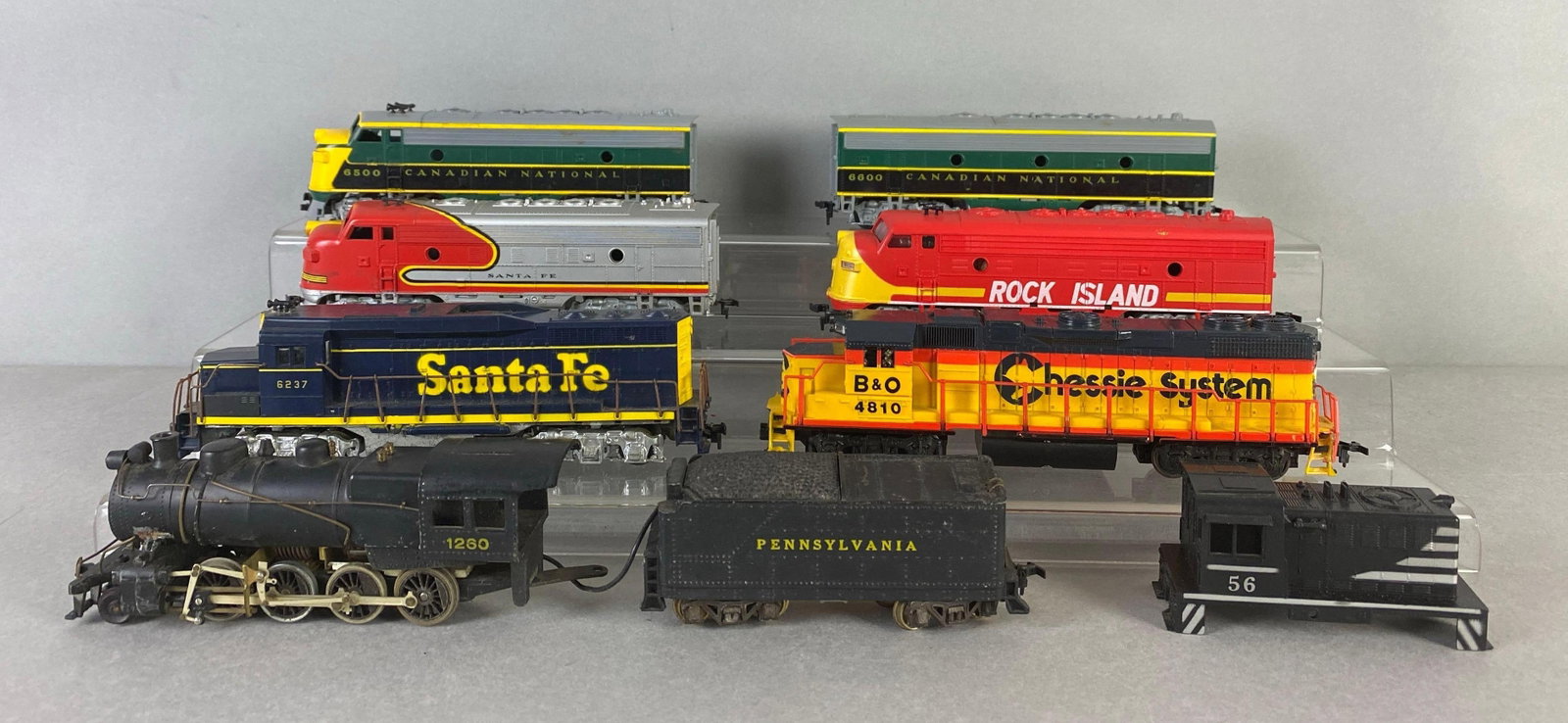 Group of HO Scale Diesel Locomotives and More: Includes coal locomotive, tender, parts and more, largest locomotive measures 8 inches in length