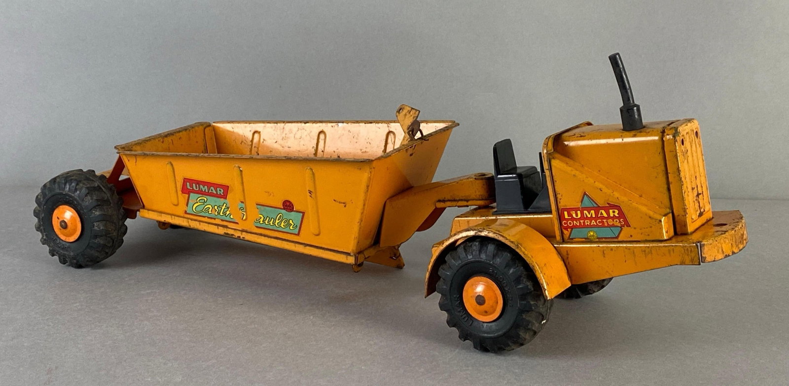 Lumar Easter Haulers Pressed Steel Tractor: Measures 5 x 18 1/2 x 5 inches