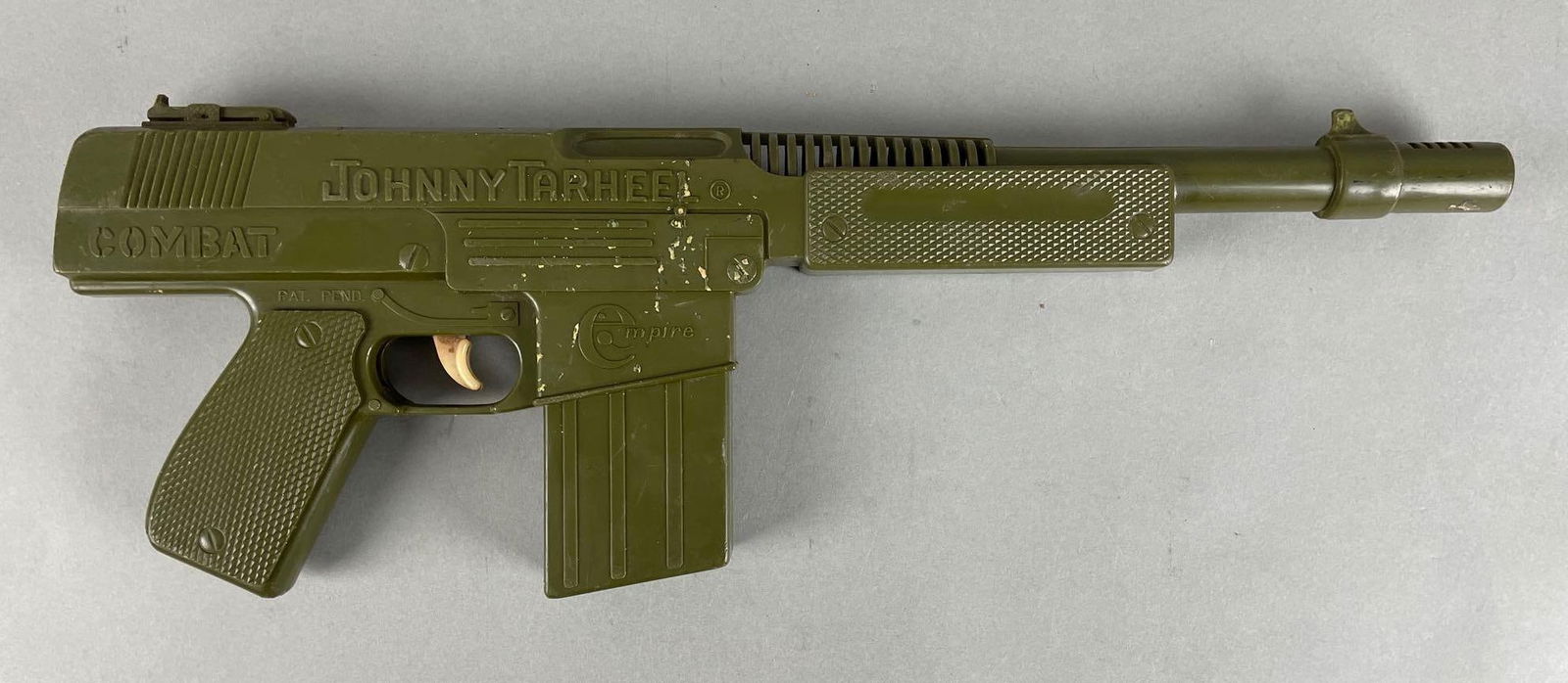 Empire Combat Johnny Tarheel Toy Machine Gun: Working condition, measures 6 x 17 1/2 x 1 1/2 inches