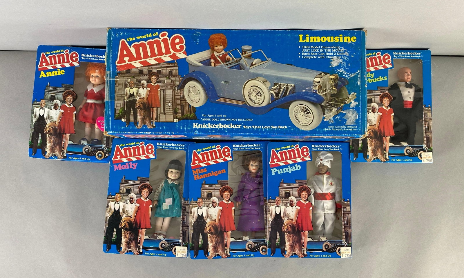 Group of The World of Annie Toys: Includes Annie, Molly, limousine and more, limousine box measures 16 1/2 x 6 1/2 x 6 1/2 inches
