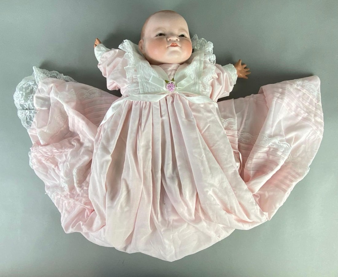 Grace Putman German No. 1278 Porcelain Head Baby Doll: 17 inches long, Porcelain head with composite hands and cloth body/legs, Marked GBL 2-3 69 on back of head, Body marked Bye-Lo baby by L. Garrard, New body, Brown eyes, Closed mouth.