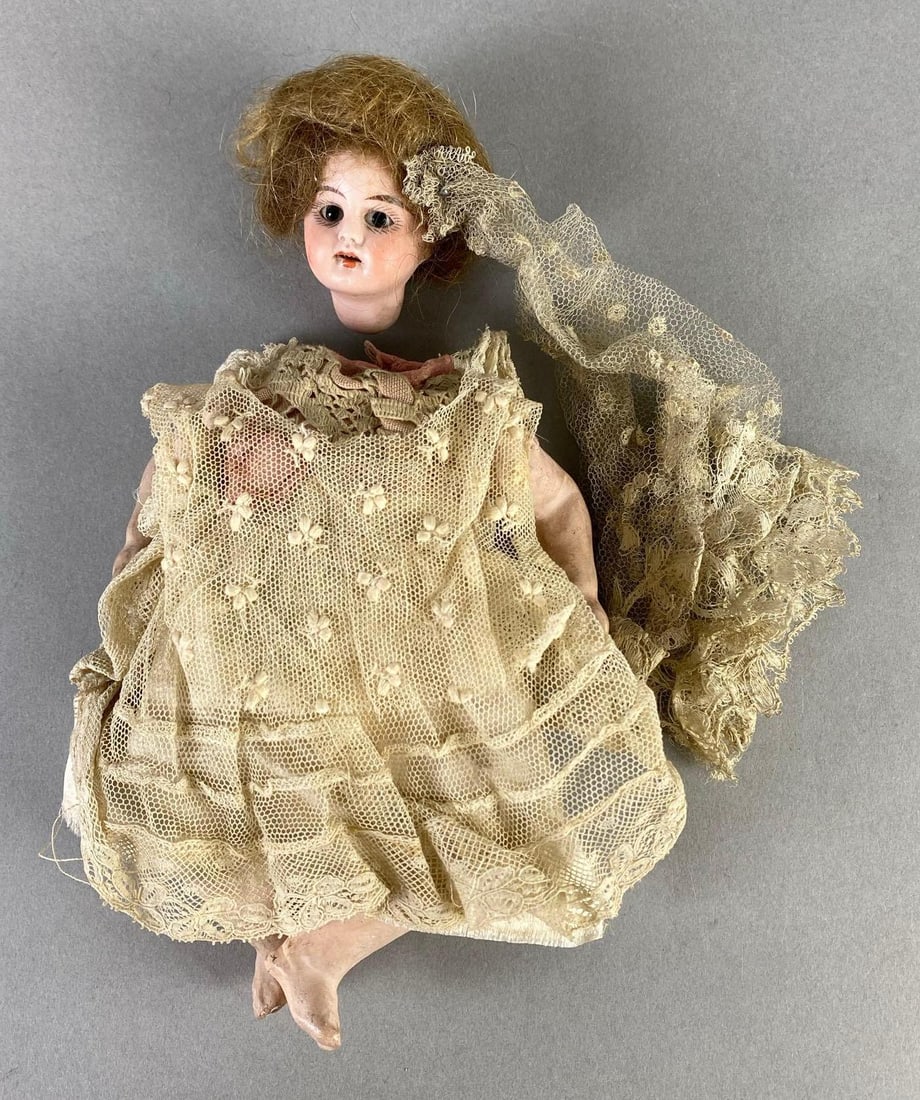 Antique Porcelain Bisque Dollhouse Doll: Porcelain bisque head with paper Mache body, Head not attached, Off-White lace dress, Measures 8 inches tall.