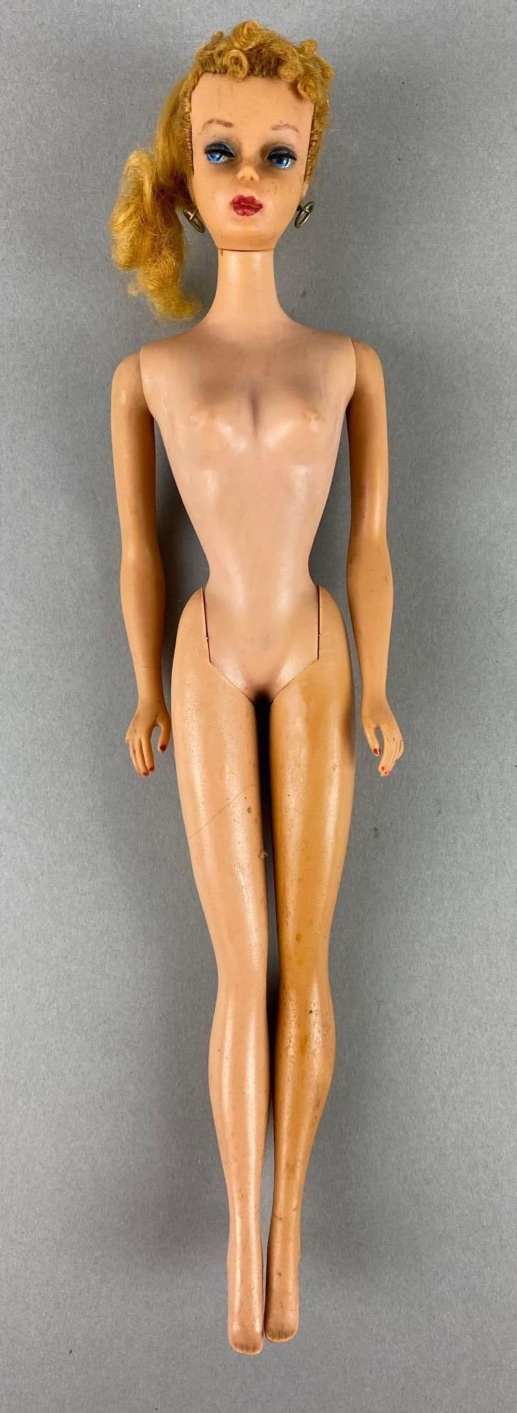 Vintage Mattel Ponytail Barbie Fashion Doll: Legs are oily. Measures 11 1/8 inches.