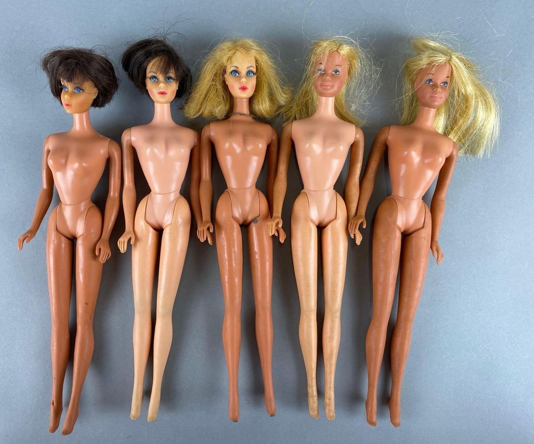 Group of 5 Vintage Mattel Dolls: All feature twist and turn with bendable legs. Wear with age. Biggest Doll Measures 11 1/2 inches.