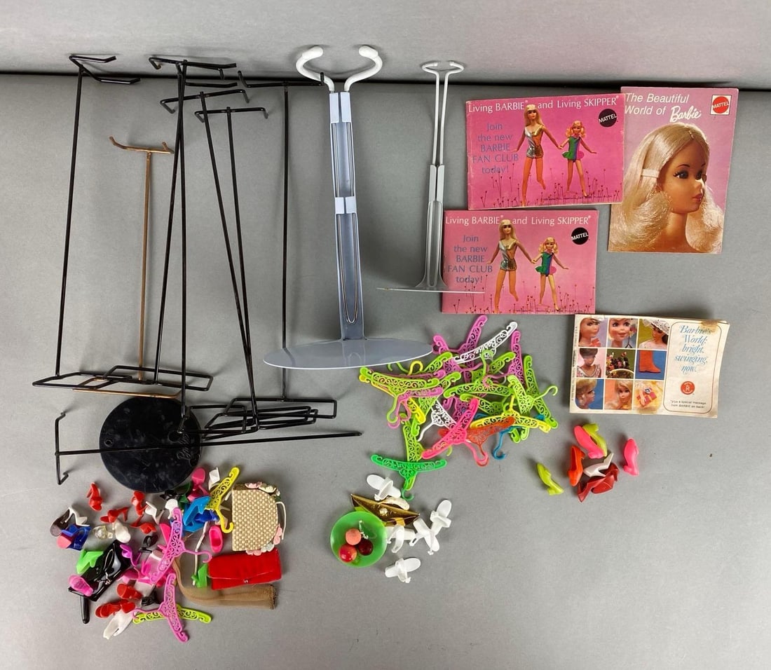 Vintage Barbie and Tammy Doll Accessories and More: Includes pamphlets, hangers, doll stands and more. Largest item measures 11 x 4 1/2 inches.