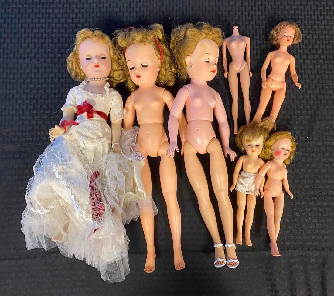 Group of Large Dolls and Dolls: Includes 3 large dolls and 3 dolls with a spare Barbie doll with no head. Largest doll measures 20 inches.