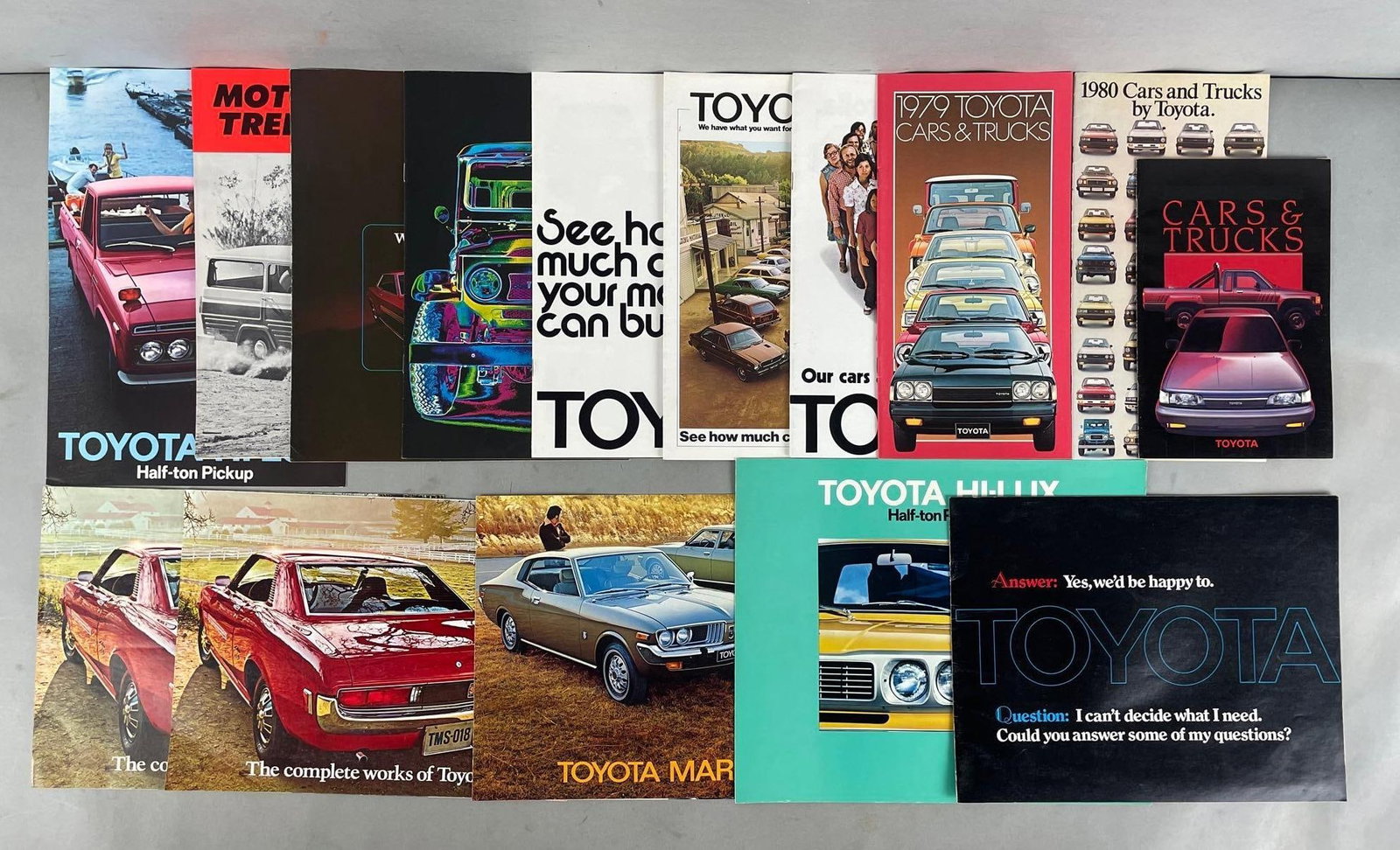 Group of Vintage Toyota Dealership Advertising Brochures: Includes Land Cruiser, hi-lux, mark II. Largest measures 9 3/4 x 11 3/4 inches