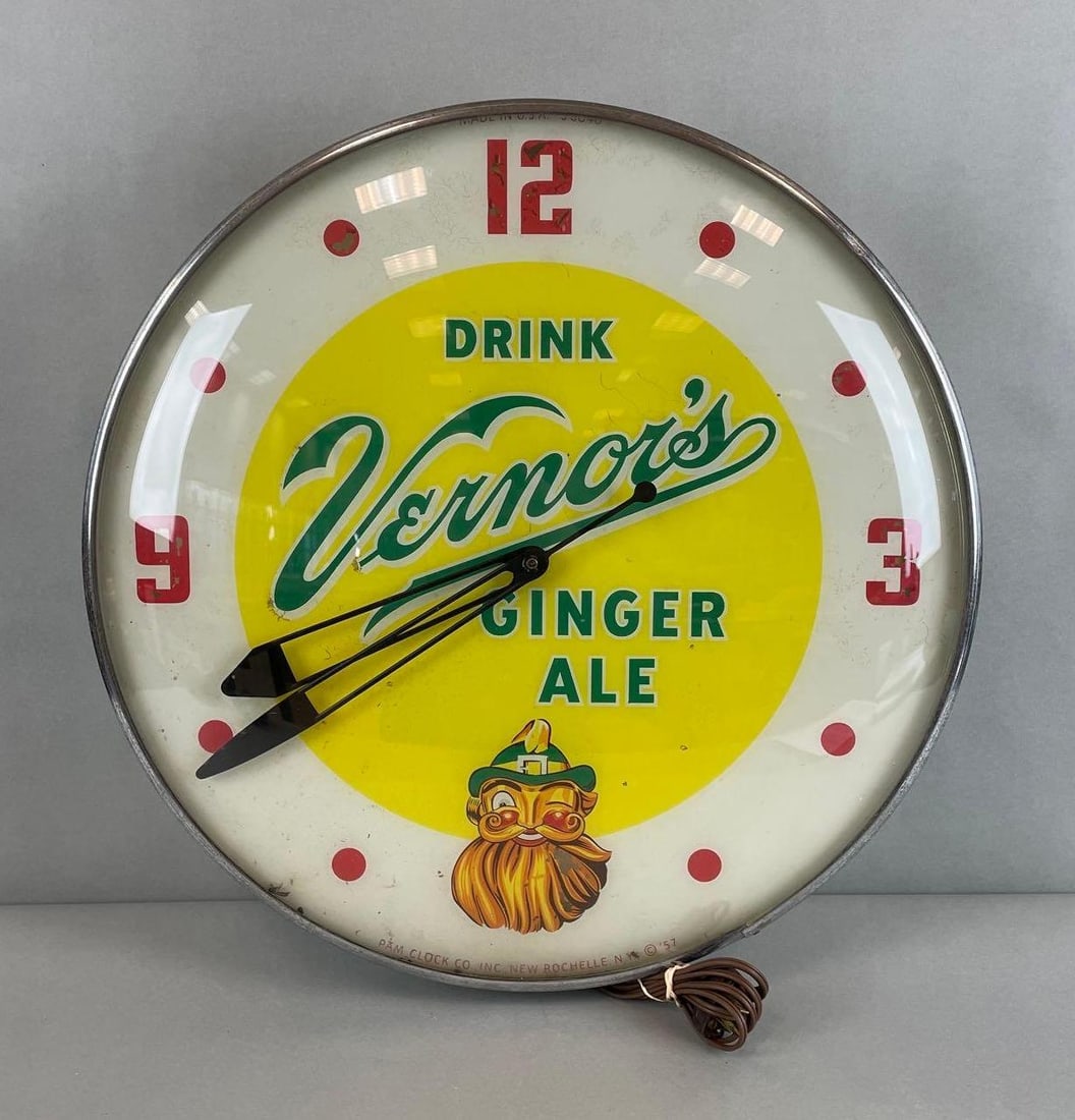 1958 Vernors Ginger Ale Light-Up Advertising Clock: Working condition, Pam clock co. Measures 4 1/2 x 20 1/2 inches