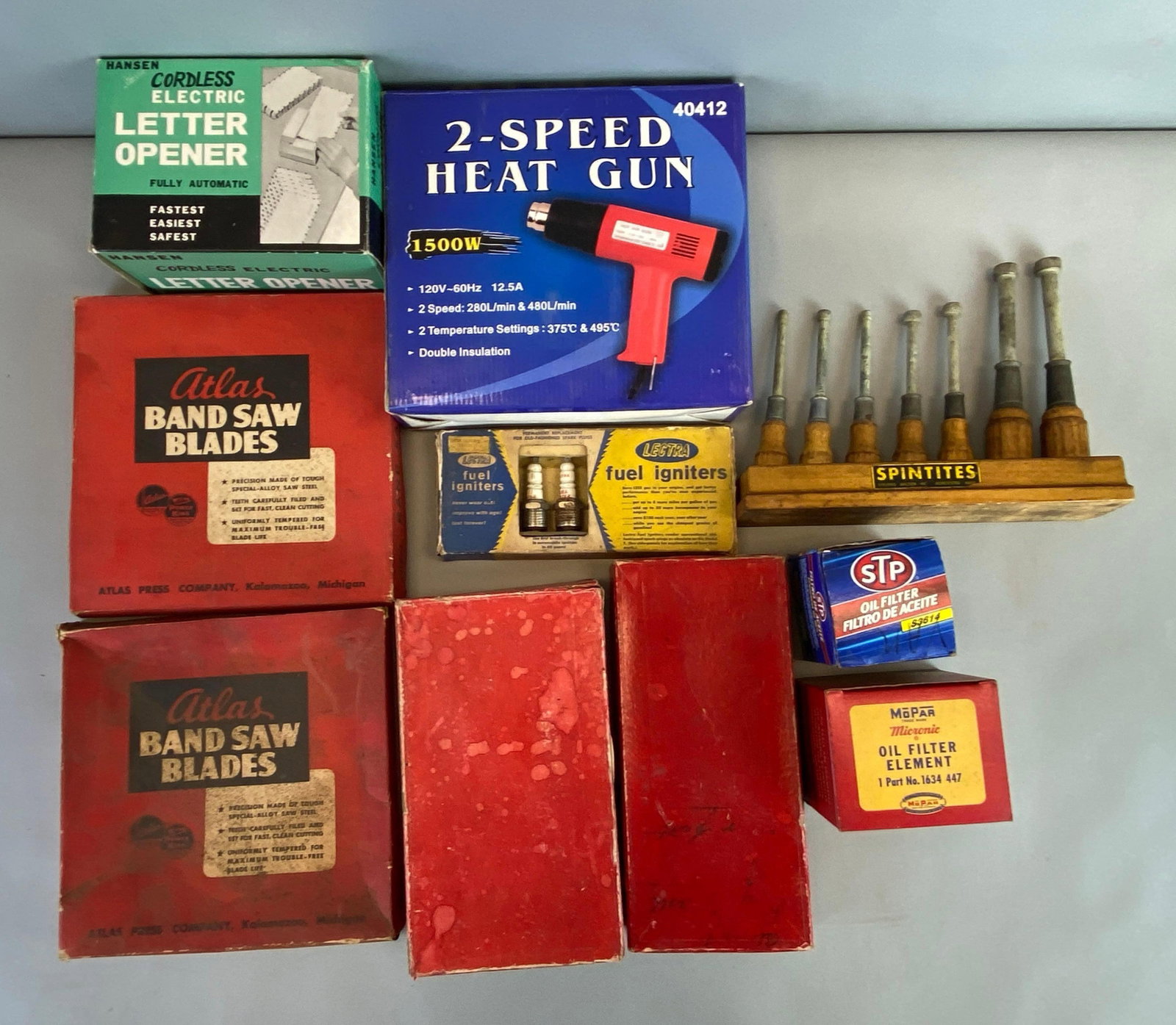 Group of Assorted Tools and Car Parts: Includes Oil Filter, Spintites, Heat gun and more, largest box measures 9 1/2 x 10 x 3 inches
