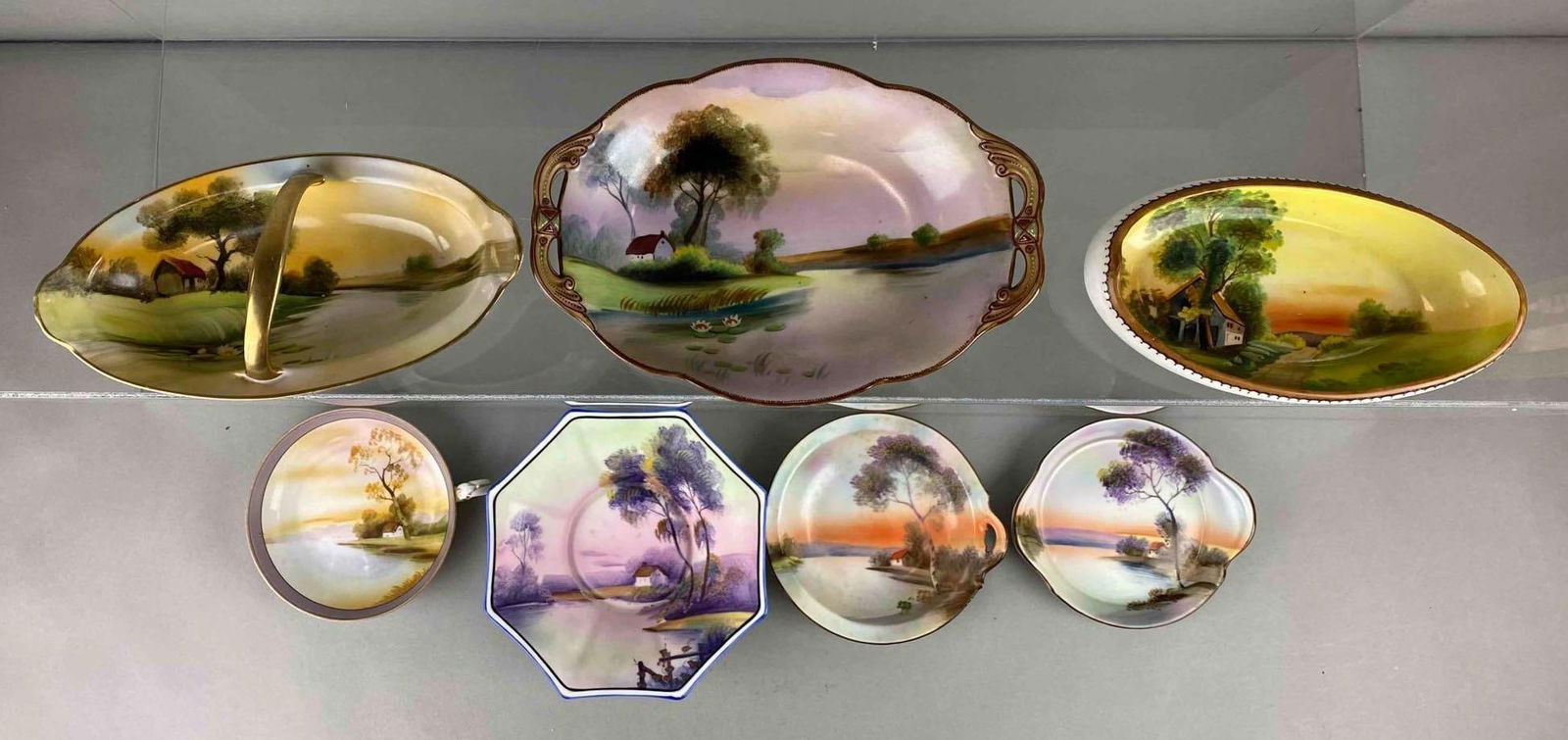 Group of 4 Noritake Hand Painted Porcelain Items and More: Depicts house by the water. Includes Nippon. Features basket tray, canoe tray, bowl and more. Largest item measures