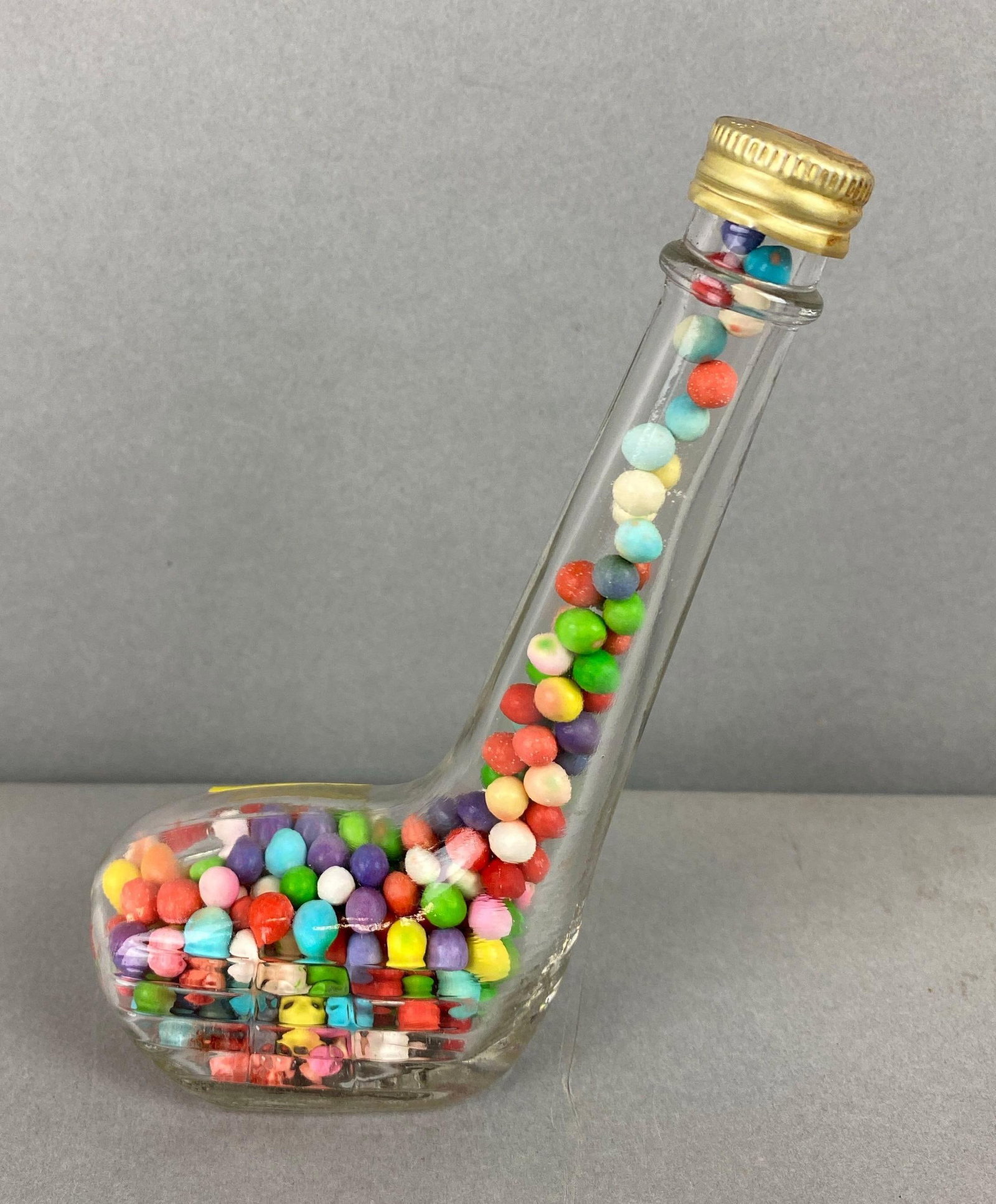 Antique Glass Golf Club Candy Container: In the shape of a gold club. Measures 5 x 2 1/2 x 2 inches.