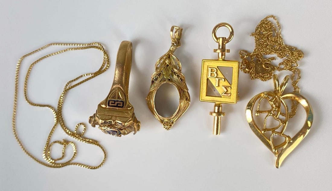 Group of 10K Gold Scrap Jewelry: Necklace clasps broken, missing stones, etc. Total Weight 12.5 grams