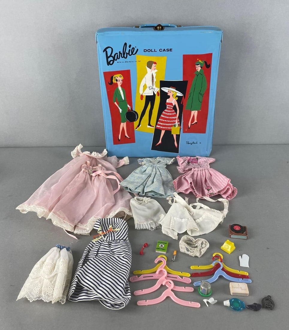 1961 Mattel Barbie Fashion Doll Case with Accessories: Includes clothes, hangers, and more. Case measures 12 3/4 x 11 x 3 inches