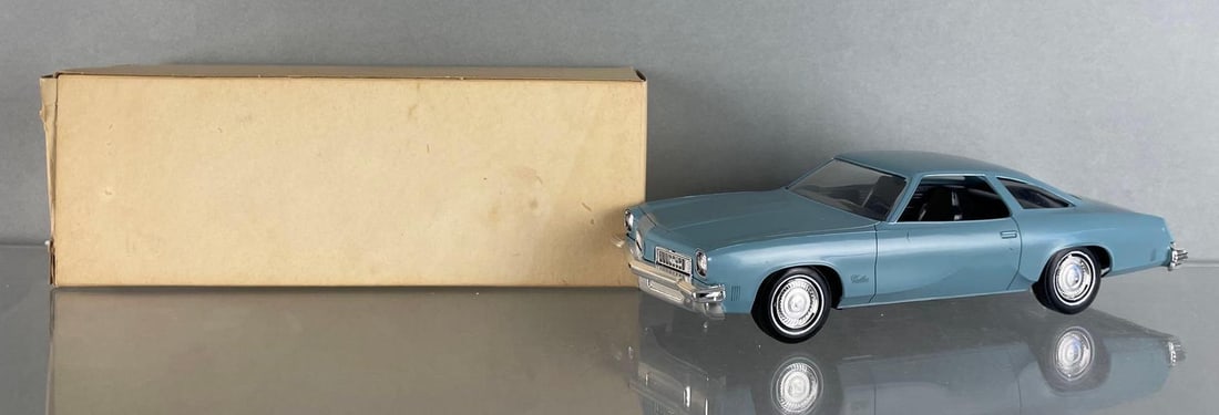 1975 Oldsmobile Cutlass Horizon Blue Dealership Promo Car: Black interior, coaster, original box