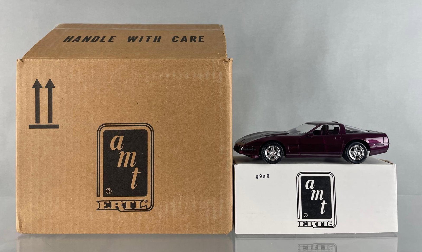 Box of 12 AMT Ertl 1995 Chevy Corvette ZR-1 Dealership Promo Cars: Dark purple metallic, original shipping box of new cars