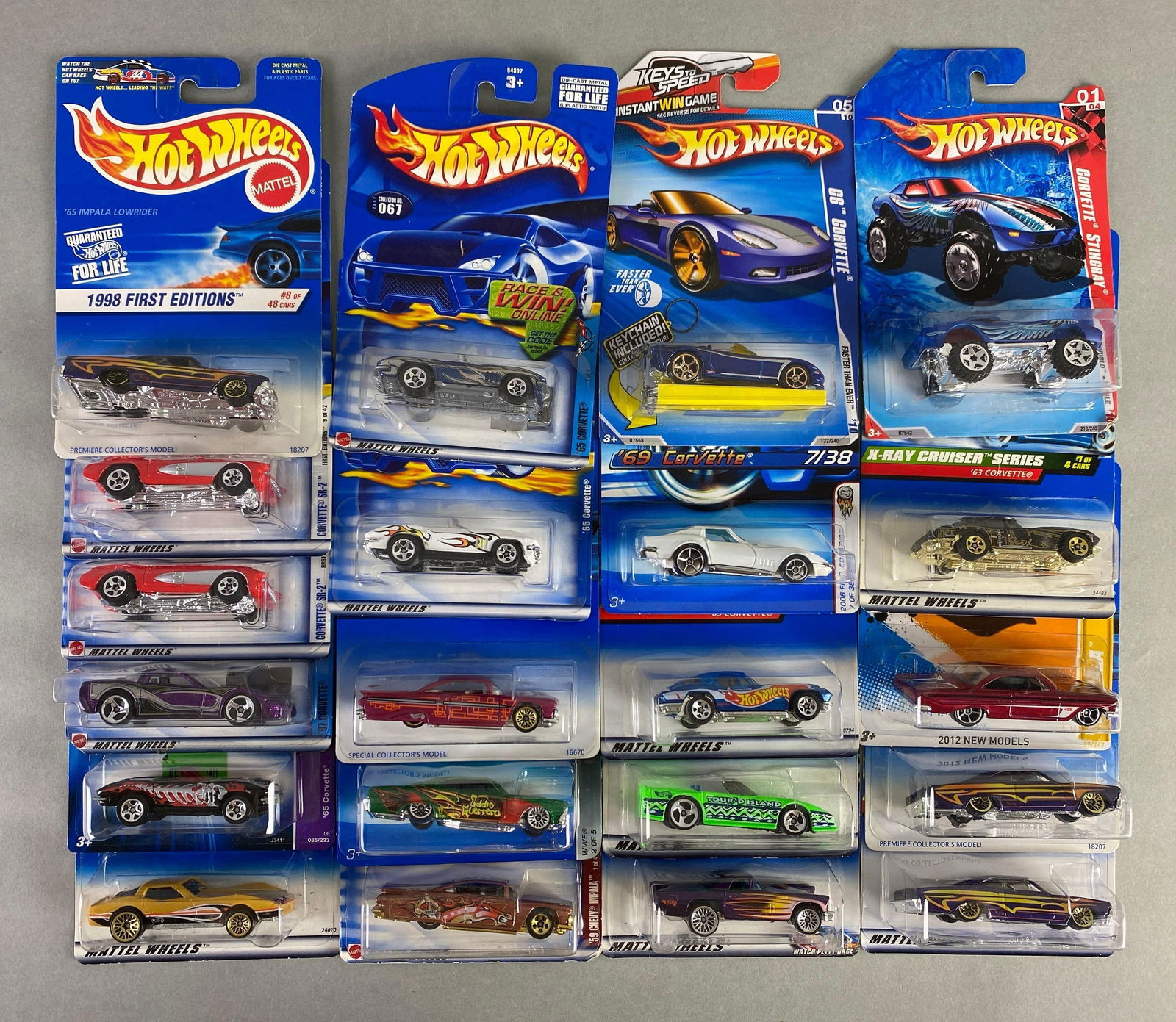 Group of 21 Mattel Hot Wheels Die-Cast Classic Cars: Includes corvette stingray, 69 corvette, 98 impala and more, like new in packaging