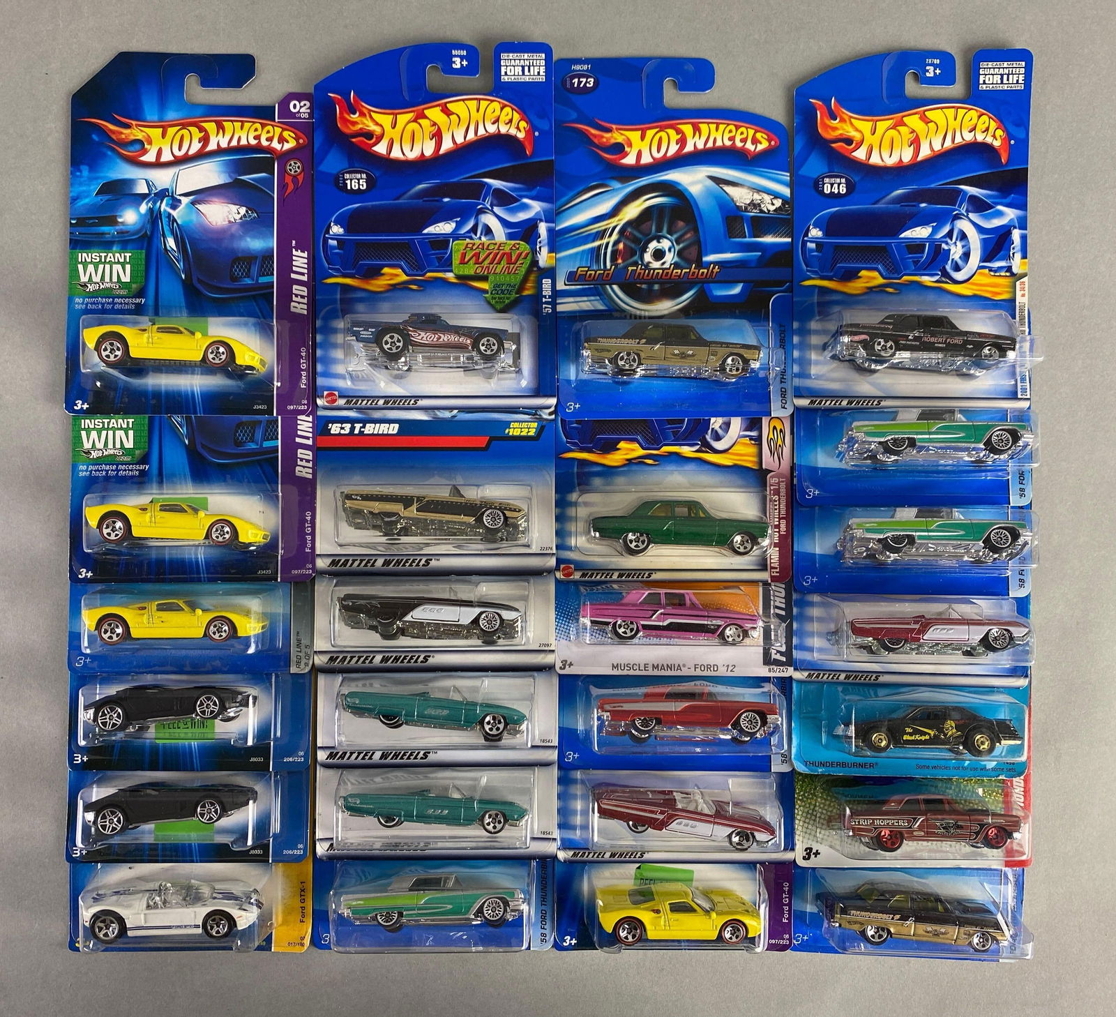 Group of 25 Mattel Hot Wheels Die-Cast Ford Cars: Includes GT-40, 67 T-Bird, Thunderbolt and more, like new in packaging