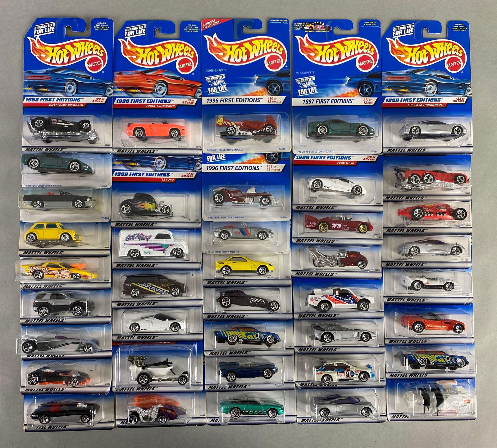 Group of 40 Mattel Hot Wheels 1990s 1st Edition Die-Cast Cars: Includes super comp dragster, Dodge sidewinder, Chrysler Thunderbolt and more, like new in packaging