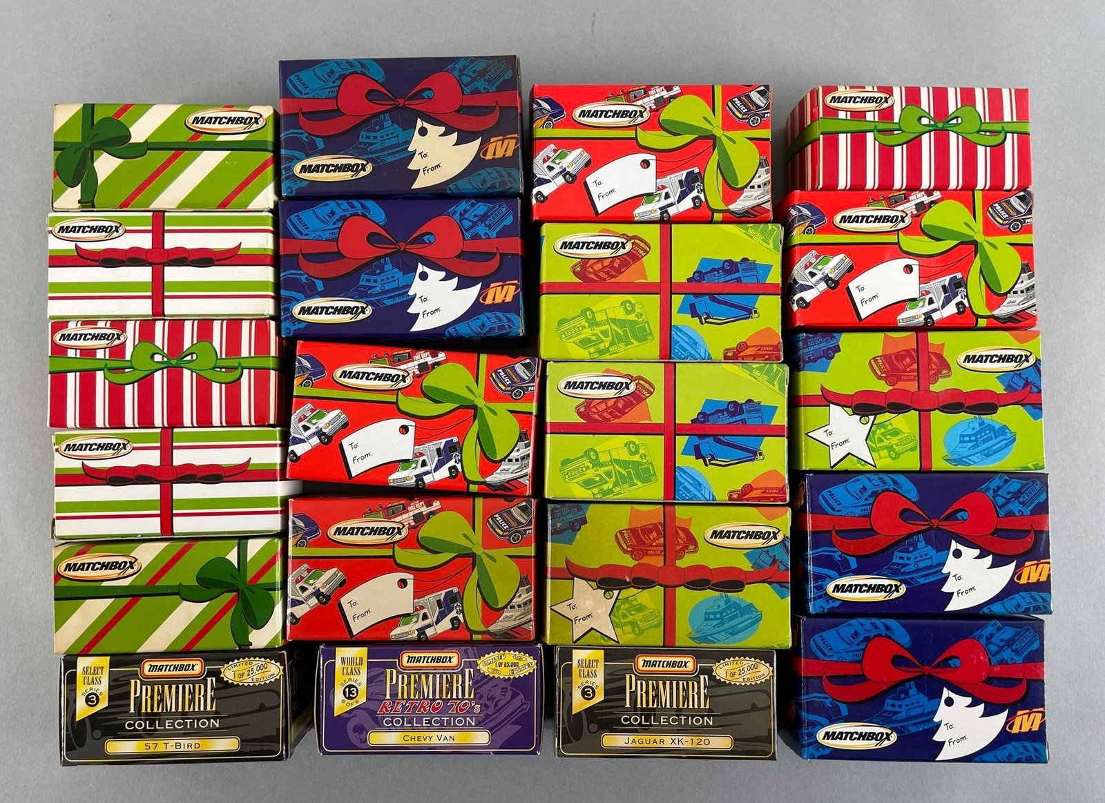 Group of Matchbox Die-Cast Vehicles: New Christmas boxes of die-cast vehicles, 57 T bird, Chevy can, jaguar xk-120
