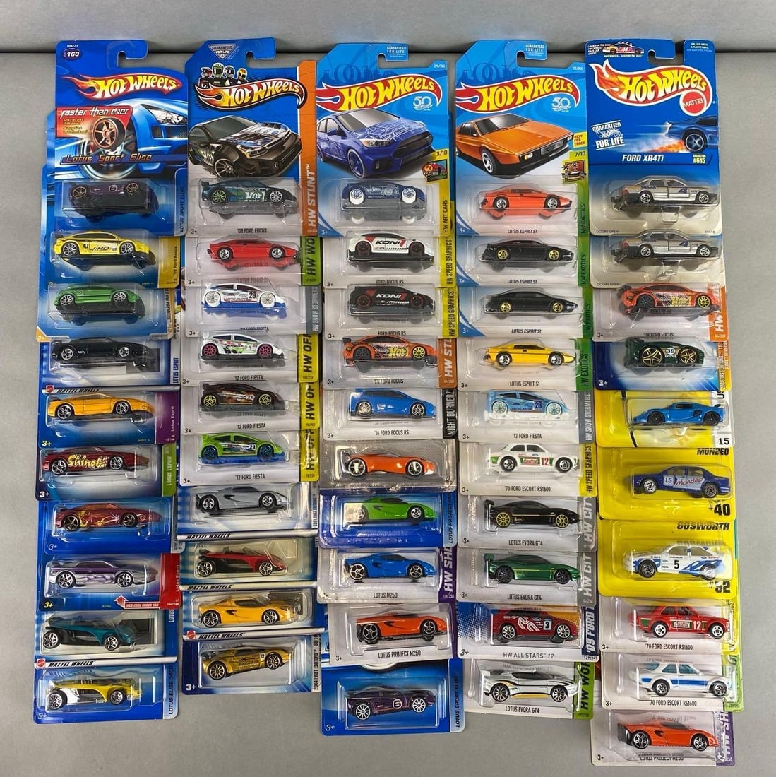 Group of 63 Hot Wheels Ford Race Lotus Die-Cast Cars and more: Includes Ford Focus, Lotus Project m250, Matchbox Ford Mondeo and more.