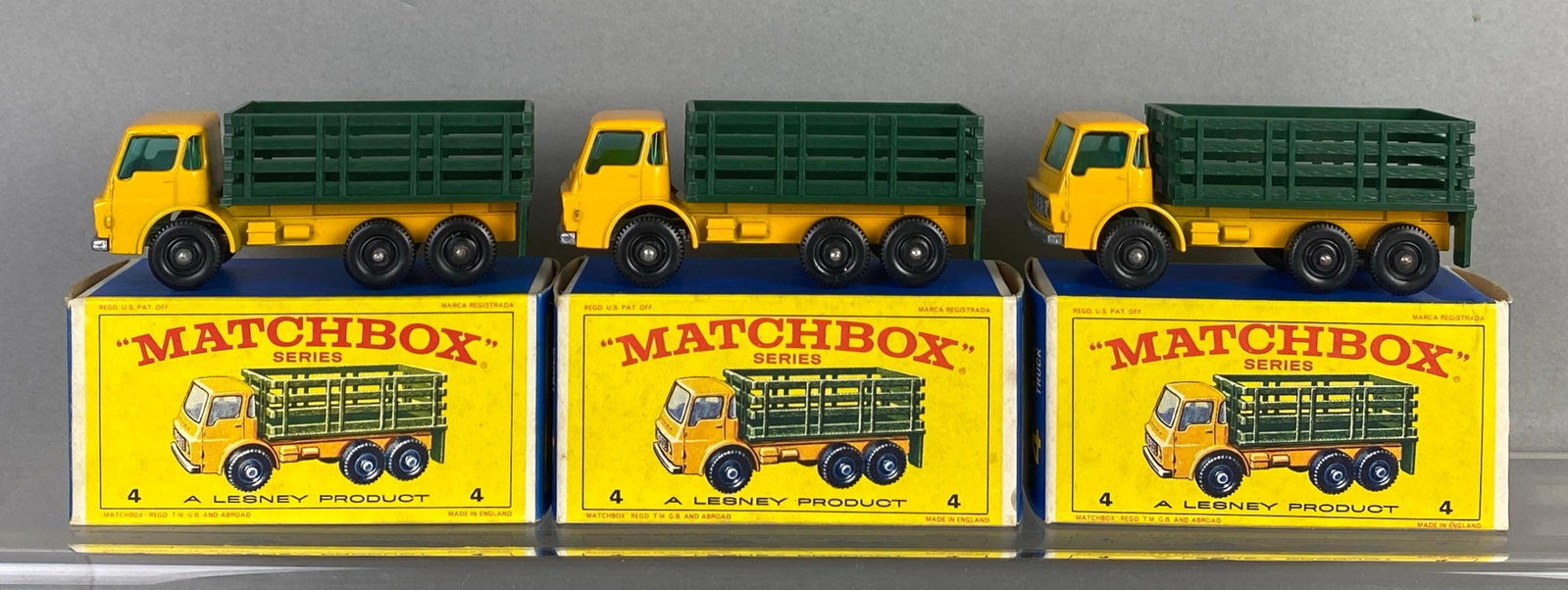 Group of 3 Matchbox No. 4 Die-Cast Stake Trucks: with boxes