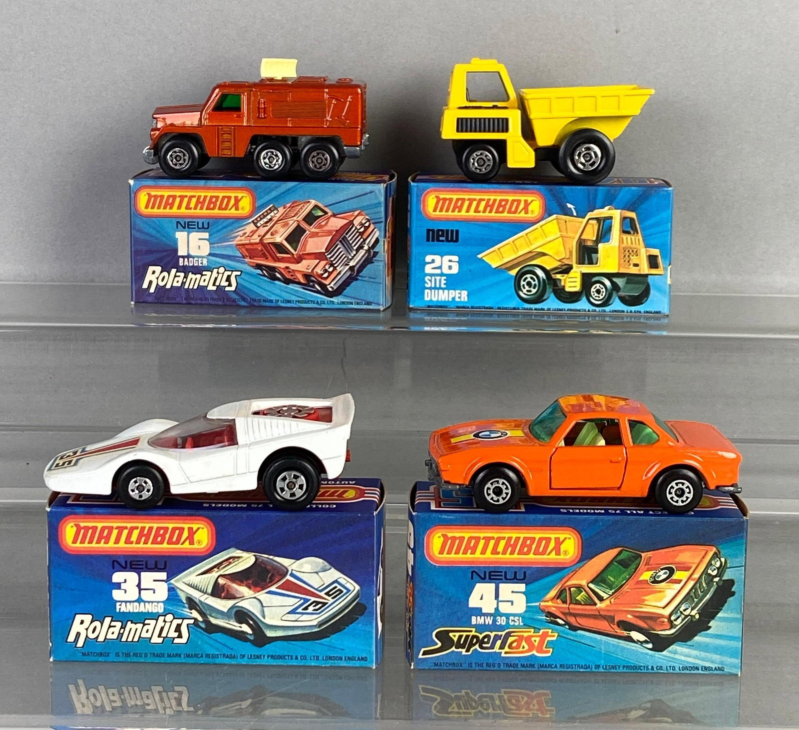Group of 4 Matchbox Die-Cast Cars: Includes No. 16 Badger, No. 36 Sit dumper, No. 35 Fandango, No. 45 BMW 30 CSL, with boxes