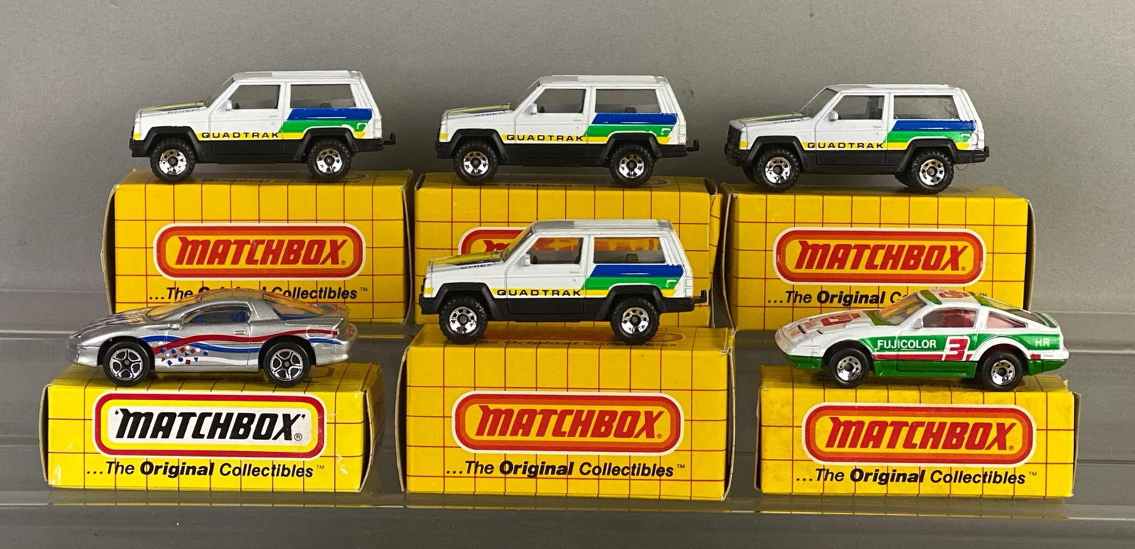 Group of 6 Matchbox Die-Cast Cars: Includes No. 27 Jeep Cherokee, No. 24 Nissan 300zx turbo and No. 43 Camaro z28, with boxes