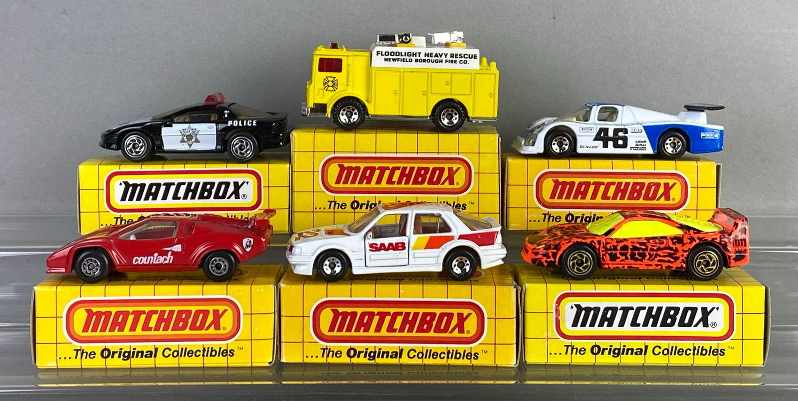 Group of 6 Matchbox Die-Cast Cars: Includes No. 67 Lamborghini Countach, No. 57 Mack Auxiliary Power Truck, No. 15 SAAB 9000 Turbo and more, with boxes
