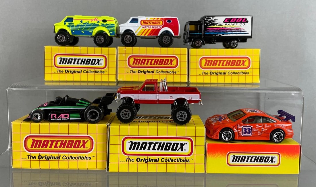 Group of 6 Matchbox Die-Cast Vehicles: Includes MB 26 Chevy van, Indy racer, opel calibra DTM, and more, with boxes