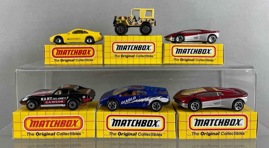 Group of 6 Matchbox Die-Cast Vehicles: Includes Jeep 4x4 Laredo, street streak, Lamborghini Diablo, and more, with boxes