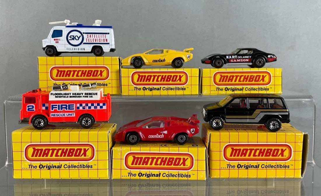 Group of 6 Matchbox Die-Cast Vehicles: Includes tv news truck, Lamborghini countach, Chevy corvette, and more, with boxes