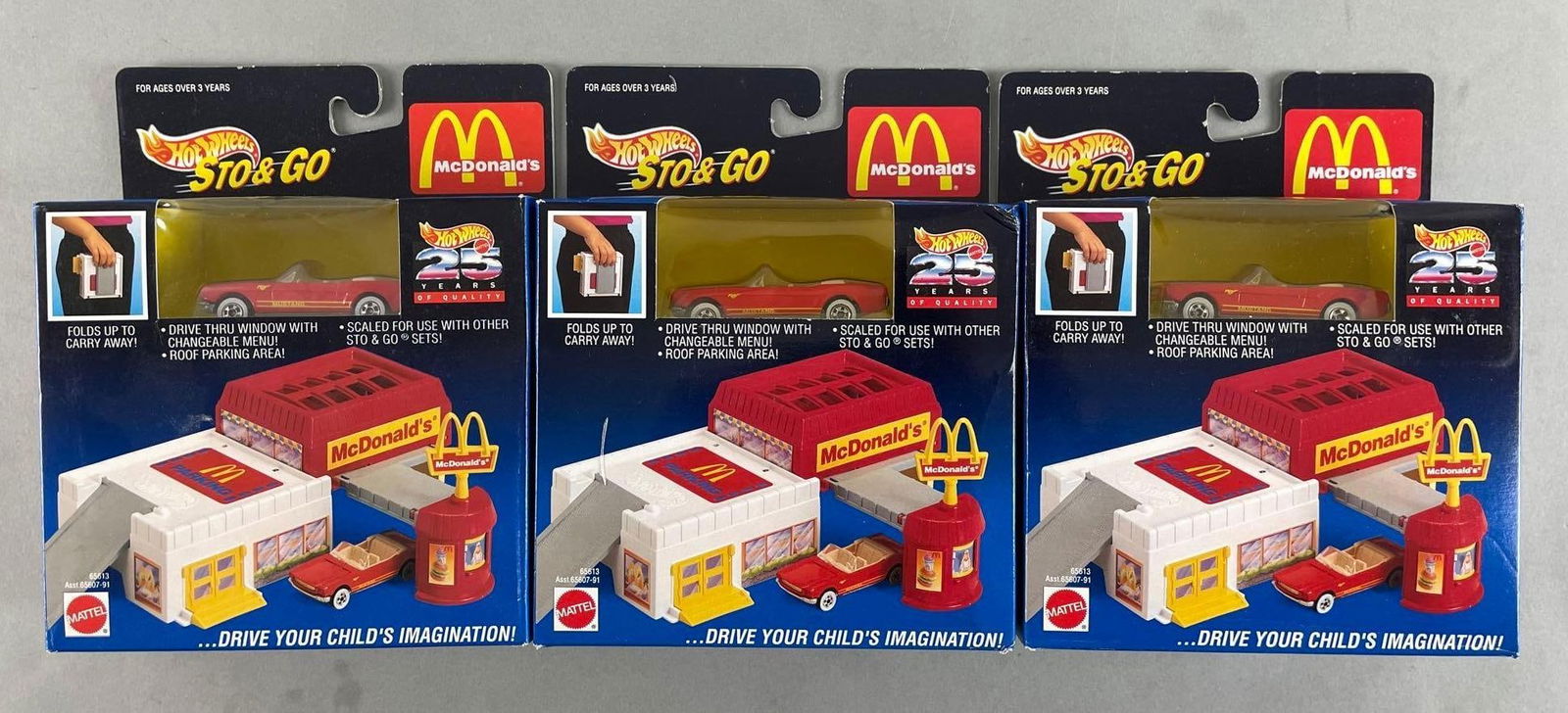 Group of Mattel Hot Wheels Sto and Go McDonalds Die-Cast Playsets: Original packaging, 1/64 scale die-cast