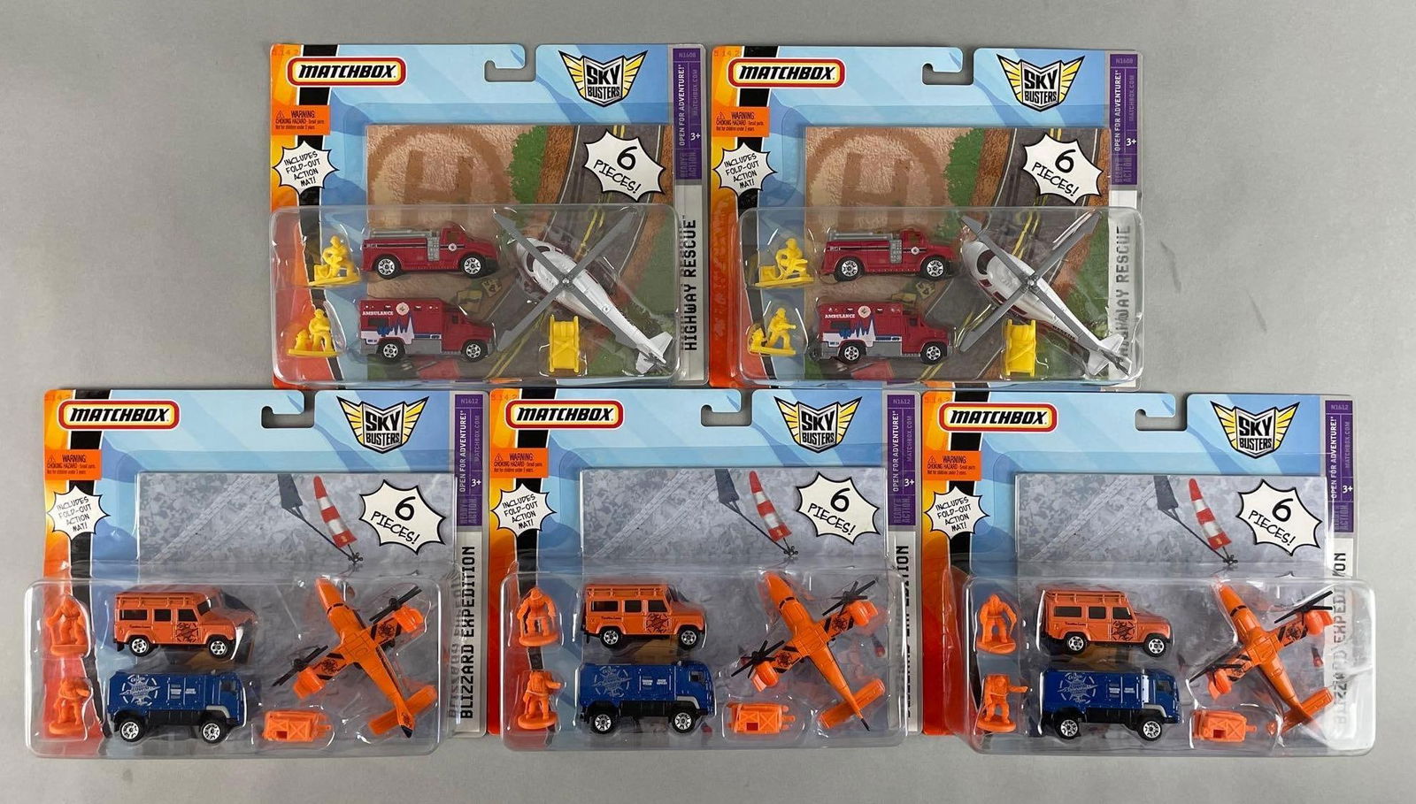 Group of 5 Matchbox Sky Busters Die-Cast Sets: Includes highway rescue, blizzard expedition. 1/64 scale, original packaging
