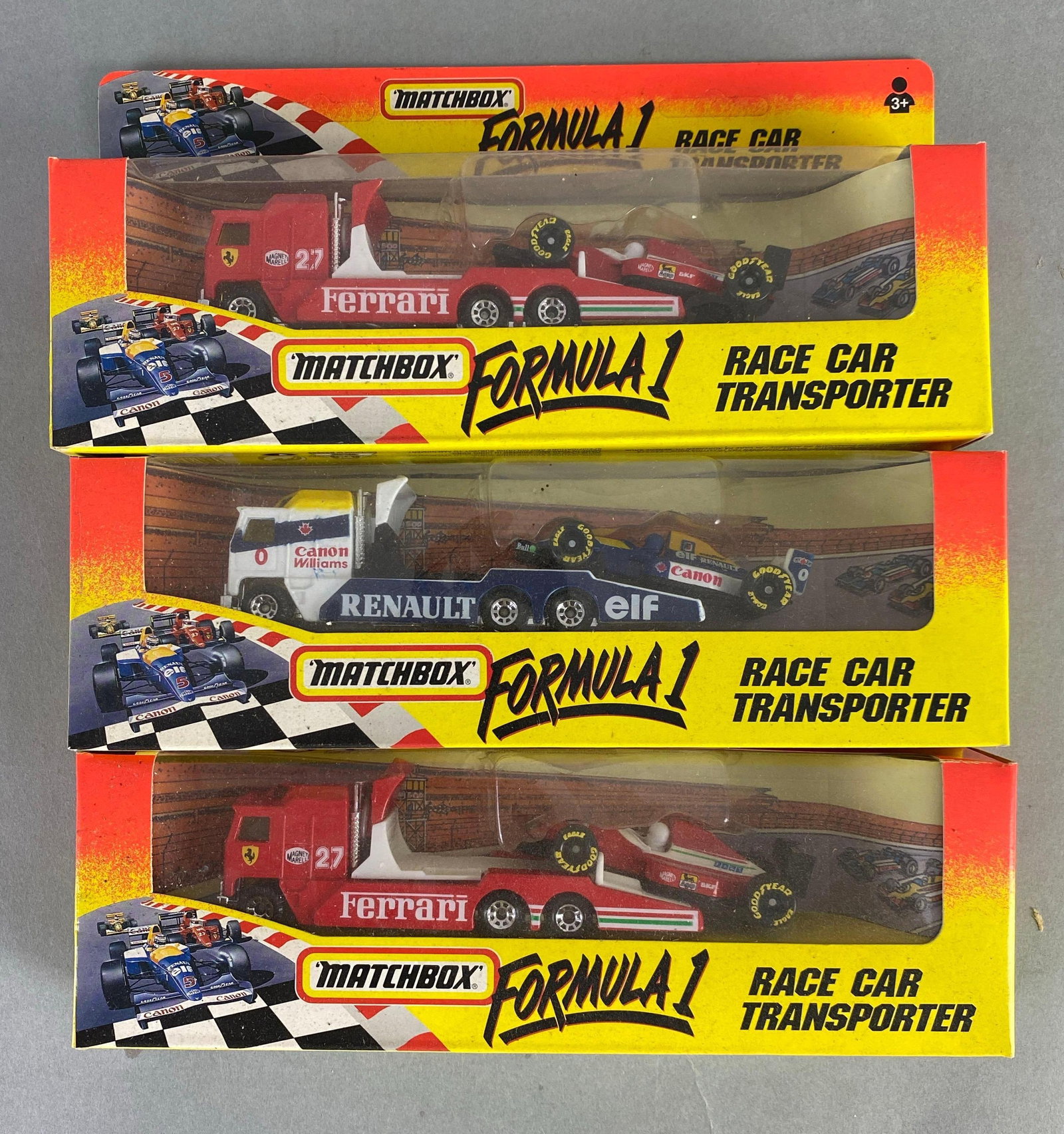 Group of 3 Matchbox Formula 1 Die-Cast Race Car Transporters: Like new in packaging, includes Ferrari and Renault