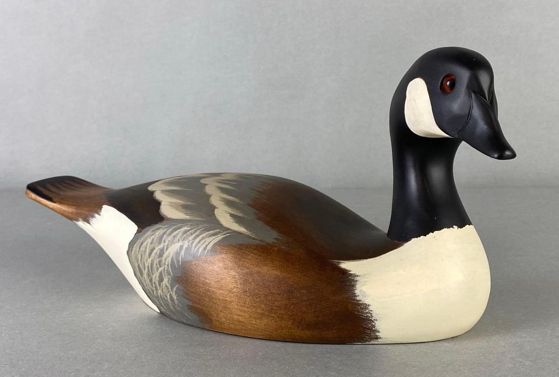 Ethan Allen P. Korman Canadian Goose Wood Decoy: Artists signature on base, Measures 6 x 13 x 5 1/2 inches.