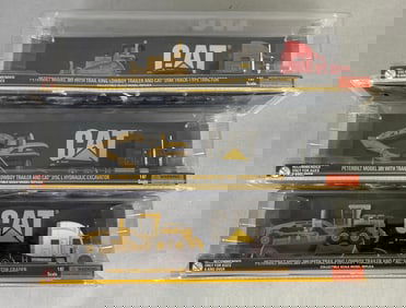 Group of CAT Die-Cast Heavy Equipment Vehicle Models and Haulers