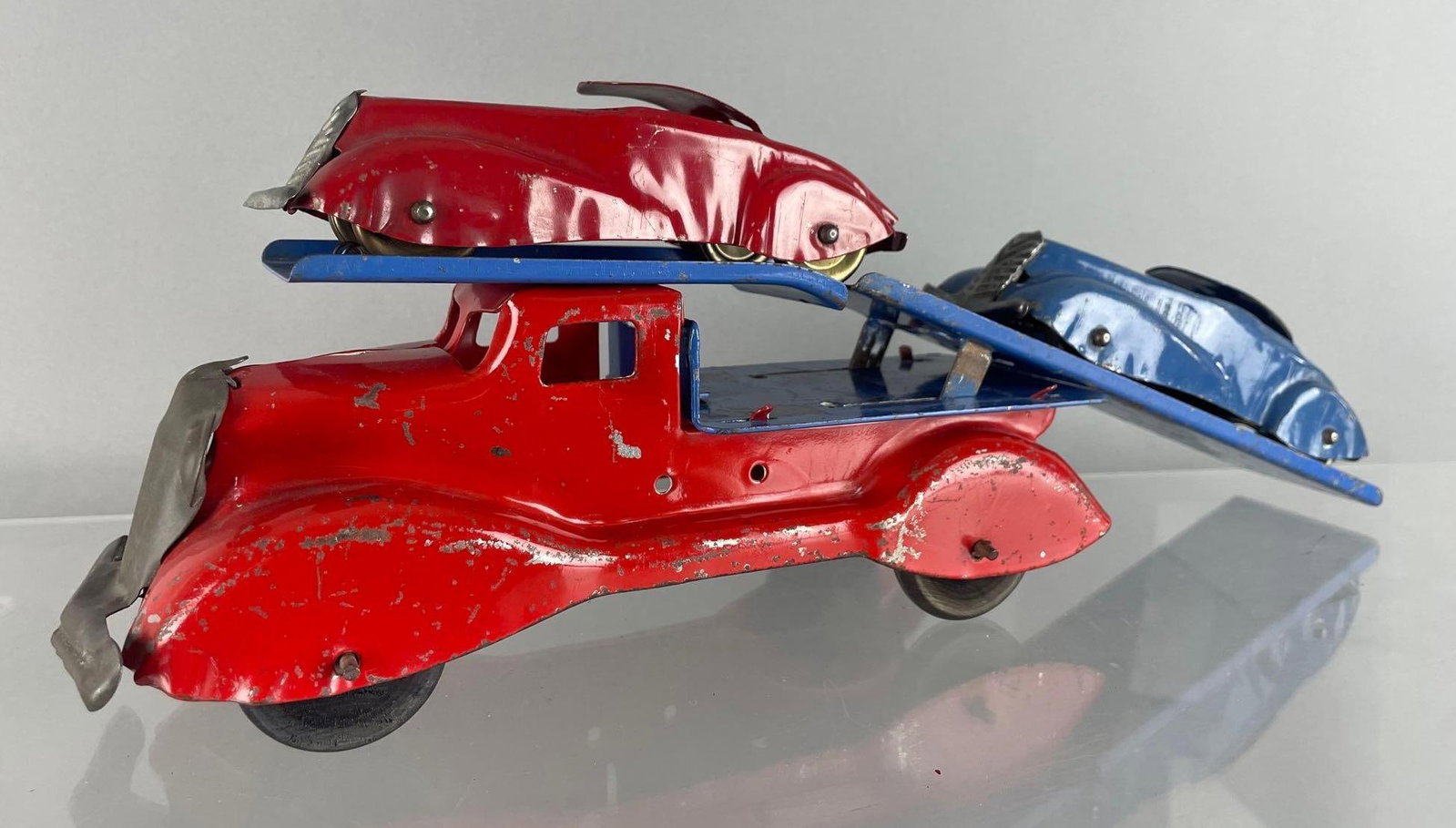 Vintage Marx Pressed Steel 2 Car Carrier: Wear consistent with age, measures 14 1/4 inches long