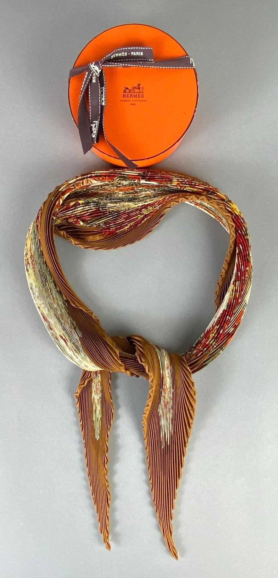 Hermes Designer Floral Motif Pleated Silk Scarf: With original box, Scarf measures 51 inches long, Box measures 2 1/2 x 5 x 5 inches.