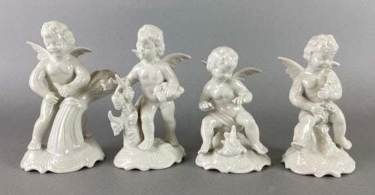 Group of 4 Dresden Porcelain Cherub Figurines