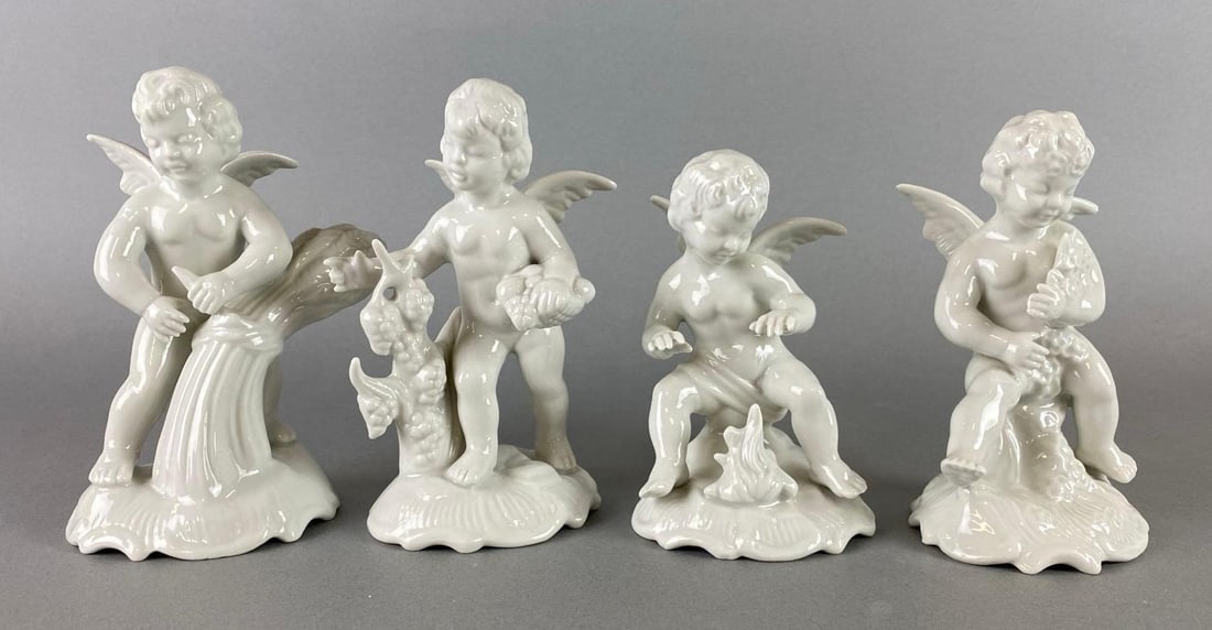 Group of 4 Dresden Porcelain Cherub Figurines: Dresden Germany. Largest measures 6 x 3 1/2 x 3 inches