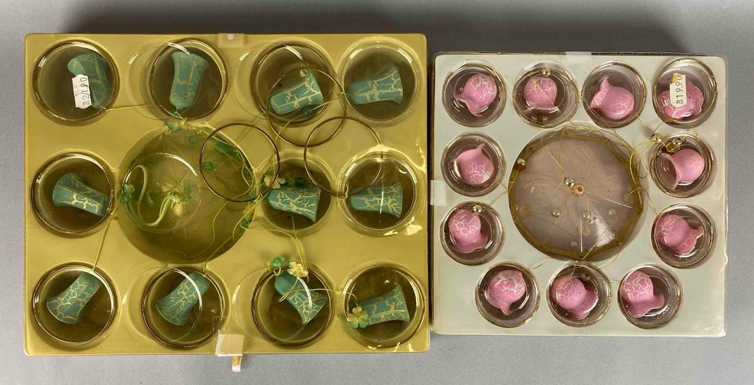 Group of 2 Glass Wind Chime Mobiles: In original packaging. pink and Blue Crackle. Yellowed with age. Largest measures 9 1/2 x 11 3/4 x 1 1/2 inches.