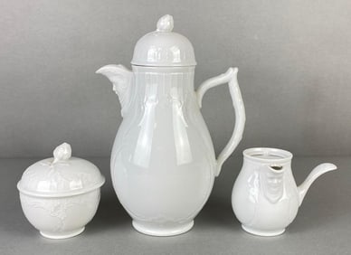 German Furstenberg Porcelain Figural Coffee Pot, Sugar, and Cream