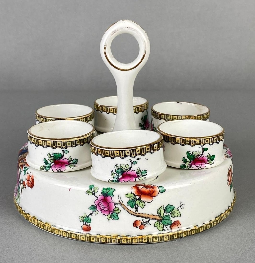 Whieldon Ware Semi-Porcelain Pheasant Cruet Set with 6 Egg Cups: Several cups with cracks, one with repaired base, one with chips on rim, Measures 5 1/2 x 6 3/4 x 6 3/4 inches.