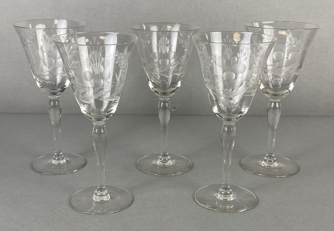 Group of Clear Etched Glass Floral Pattern Wine Glasses: All measure 7 3/4 x 3 1/2 x 3 1/2 inches.
