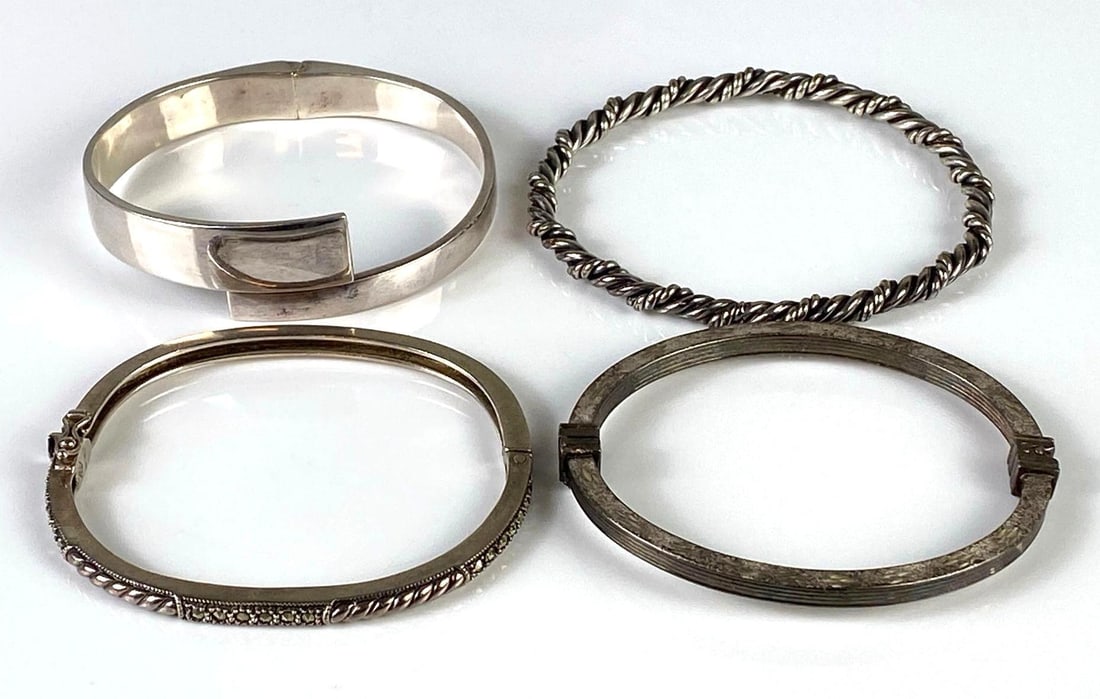 Group of Sterling Silver Bangle and Cuff Bracelets: Total weight 97.4g, Largest measures 7 1/4 inches around.