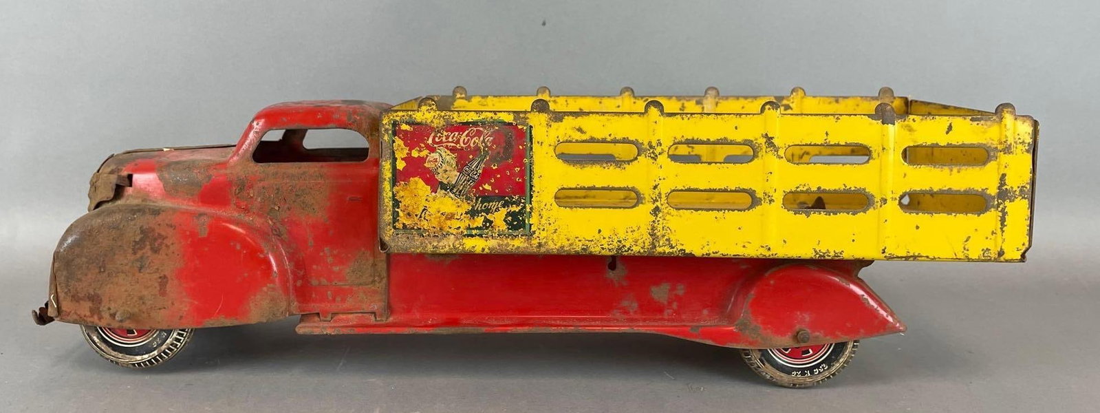 Vintage Marx Coca-Cola Pressed Steel Delivery Truck: Lots of damage at front end, bed tilts, measures 6 x 20 1/4 x 6 inches