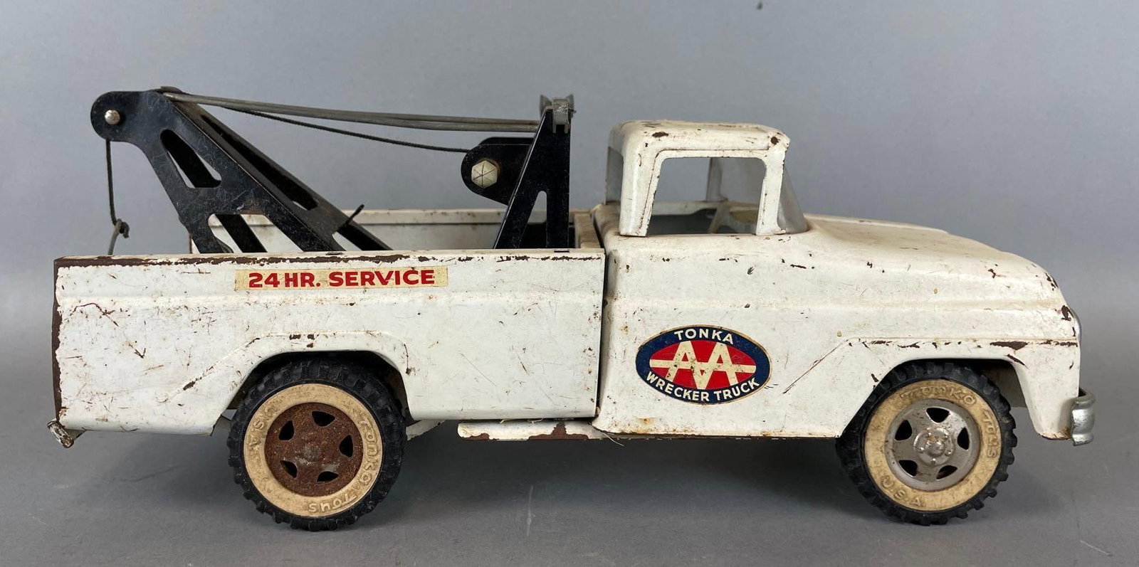 Vintage Tonka AA Pressed Steel Wrecker Truck: Child's name in marker on roof, marker on bottom too. Measures 6 x 14 x 5 inches